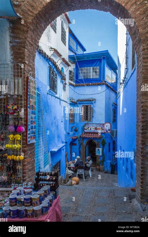 A Colourful Narrow Street Scene In The Blue City Of Chefchaouen