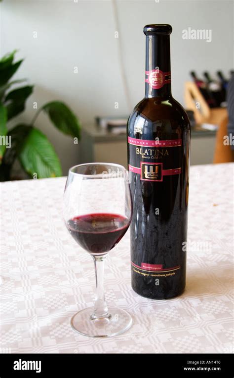 Wine Glasses In The Tasting Room Bottle Of Blatina Vrhunsko Suho Vino