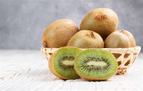Fresh Kiwi Fruit Whole And Cut Stock Photo Image Of Juicy Dessert