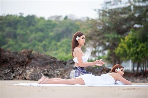 Beautiful Asian Woman Enjoying Spa Massage Therapy On The Beach Stock Photo Image Of Beach