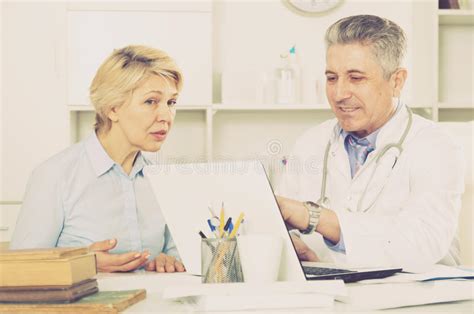 Mature Woman Visits Doctor Stock Image Image Of Friendly 87905139