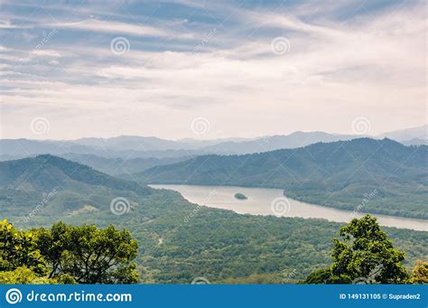 Tropical Mountain Landscape With Foggy Mountains Covered With