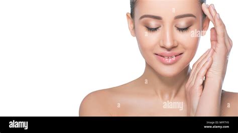 Smiling Face Of Young Adult Woman With Clean Fresh Skin Isolated On