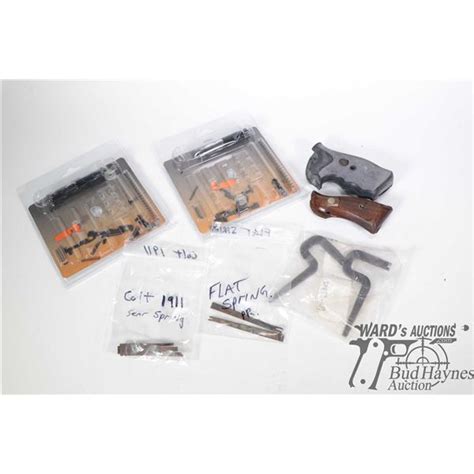 Selection Of Colt Handgun Parts Including Two New In Package Gsg 1911