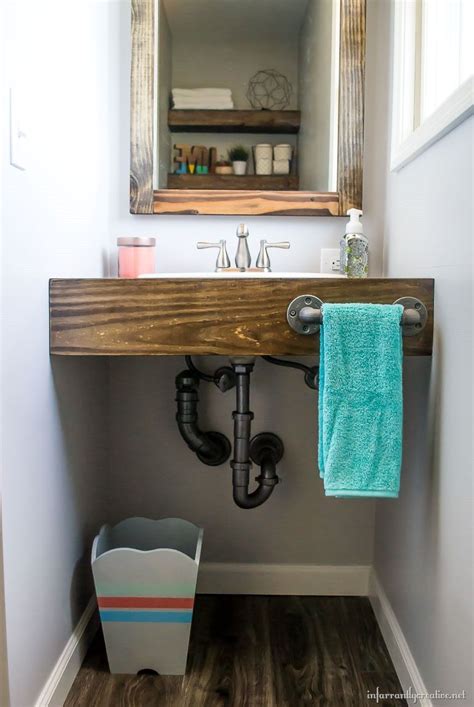 Paint your bathroom sink with a special little product from rustoleum called appliance epoxy. DIY Floating Wood Vanity - Infarrantly Creative | Small ...