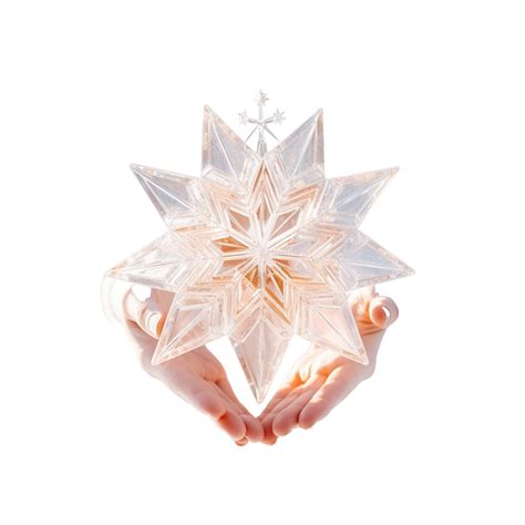 Crystal Star Christmas Decoration On A Snowy Evergreen Tree In The