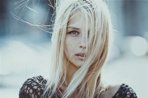 Beautiful woman with bright eyes makeup. women blonde face freckles women outdoors blue eyes hair ...