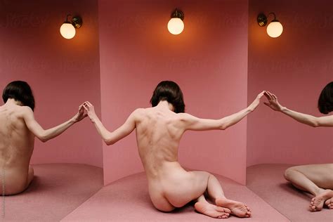 Naked Woman In A Pink Room With Mirror Walls By Stocksy Contributor