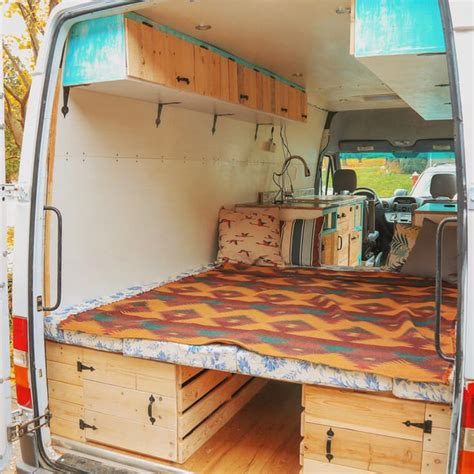The Back End Of A Van With An Open Bed