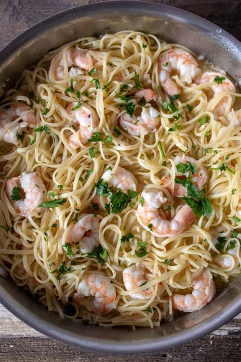 Cook until onion is transparent, about 4 minutes. Easy Shrimp Scampi Linguine Recipe with Garlic, Lemon + White Wine