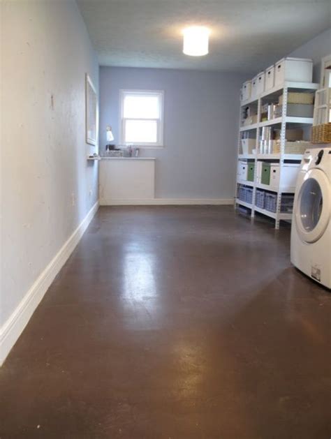 This concrete floor has been painted many times and definitely shows some old paint flaking and chipping over the years. Painted concrete floors! Introducing my new living room floor! Good bye stinky, kid puke, juice ...