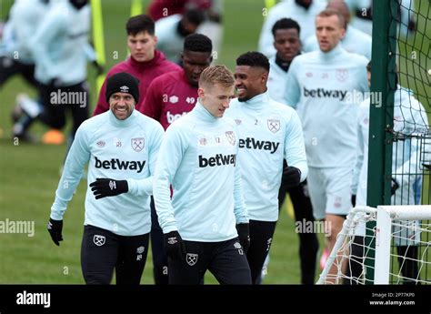 West Ham Uniteds Danny Ings Left And Flynn Downes Centre During A Training Session At The