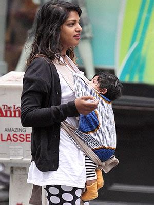 Bag slings are triangular, with a flat bottom and two sides that converge. Celebrity Baby Sling Watch: M.I.A. carries Baby Ikhyd in a ...