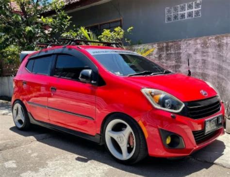 Cara Modifikasi Mobil Ayla Merah Terlihat Keren Dengan Anggaran Terbatas