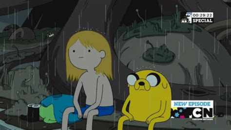 Adventure Times Finn And Jake Sit In The Rain While Getting