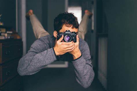 Man Taking A Photo With Nikon Camera Image Free Stock Photo Public