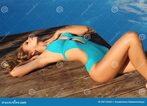 Beautiful Tanned Girl With Long Blond Hair In Elegant Swimsuit Stock Image Image Of Summertime