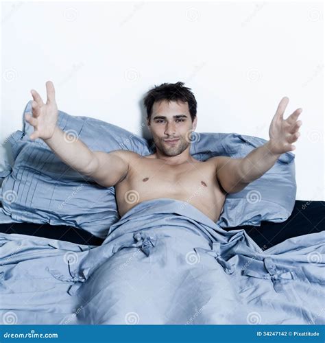 Handsome Man In A Bed Stock Photo Image Of Casual Caucasian