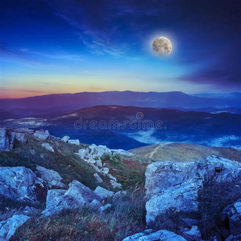 Light On Stone Mountain Slope With Forest At Night Stock Image Image