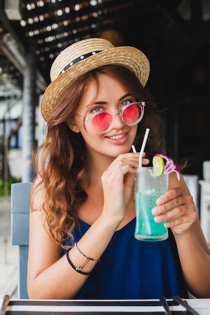 Free Photo Attractive Young Woman In Blue Dress And Straw Hat Wearing