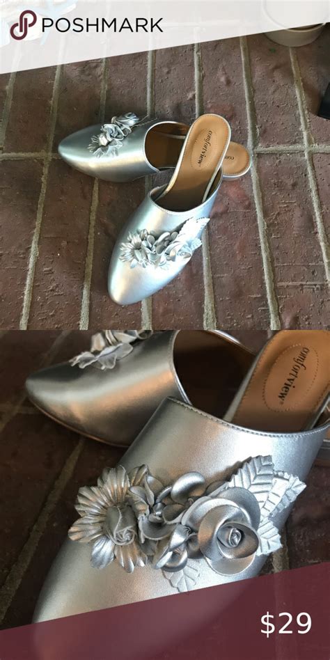 The Ayla Mule Size 9w Silver With Flowers Mules Leather Silver