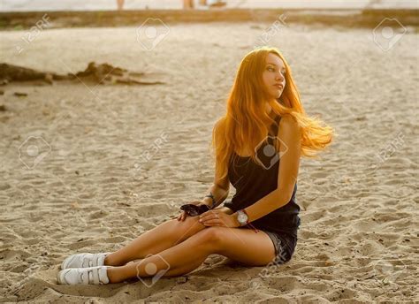 Awesome Redhead Woman Sitting On A Beach Aff Redhead Awesome