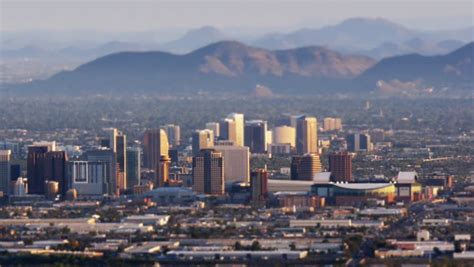 Skyline view of phoenix, arizona desert with saguaro cactus and city in background at sunset. Pan Of The Downtown Phoenix Arizona Skyline, Left To Right, From Above. HD 1080p. Stock Footage ...