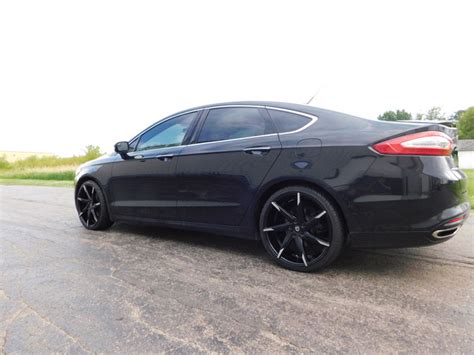 Get behind the wheel today! 2014 Ford Fusion 20x8.5 Lexani Lexani Tire 225/35R20