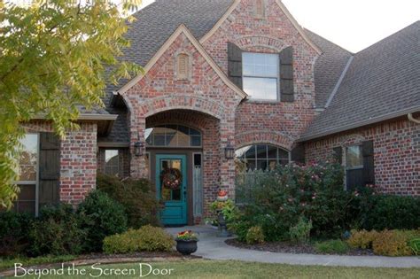 They give passersby small clues about who may live inside. Turquoise Front Door | House shutters, Painted front doors ...