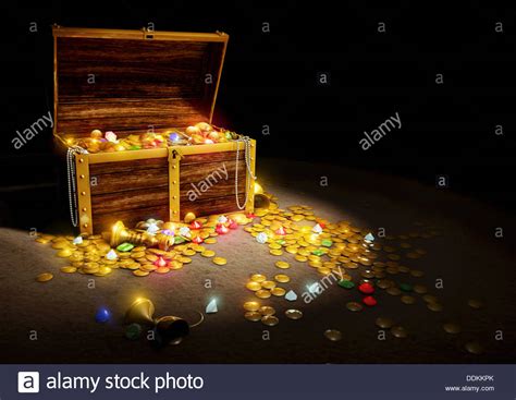 Gold Coins And Jewels Spilling From Treasure Chest Stock