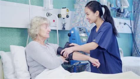 Nurse Taking Care Of Patient — Stock Video © Hotelfoxtrot 45476729
