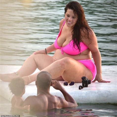 Ashley Graham Shows Off Her Growing Baby Bump As She Does Yoga In A Pink Bikini While In Jamaica