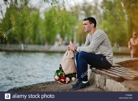 Happy propose day 2017 wishes quotes messages happy propose day 2017. Man with a bouquet of flowers waiting for his girlfriend ...