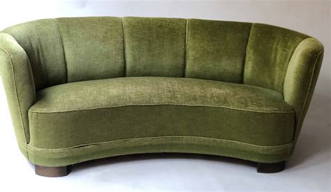 Art Deco Style Sofa Of Curved Form With Green Velvet Corded Upholstery
