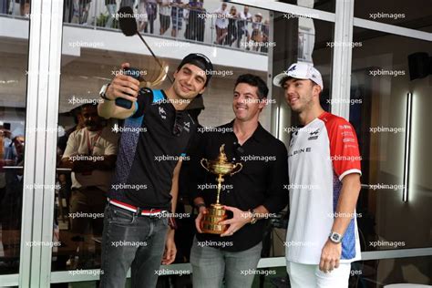 L To R Esteban Ocon Fra Alpine F Team With Rory Mcilroy Gbr