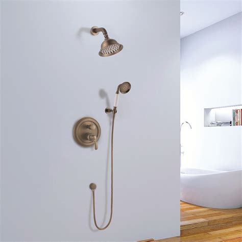A Bathroom With A Bathtub Shower Head And Hand Held Shower Faucet