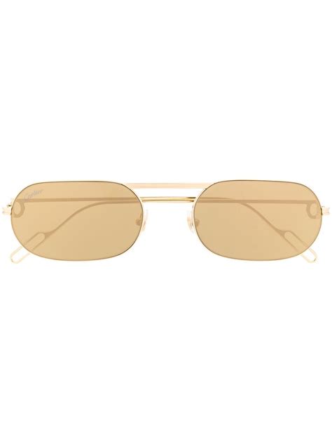 Cartier Première De Oval Frame Sunglasses In Gold Modesens