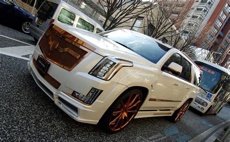 Fully Customized White Cadillac Escalade on Bronze Custom Wheels ...