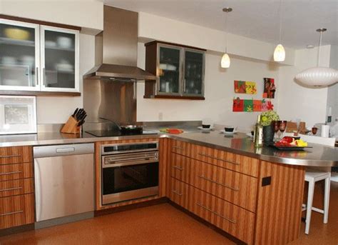 Shock and awe kitchen renovation features touchless cabinets, roberto cavalli porcelain tiles and zebra veneer wood ribbon accents. Kitchenscapes Portfolio - Skiwatch Kitchen Showing Zebra ...