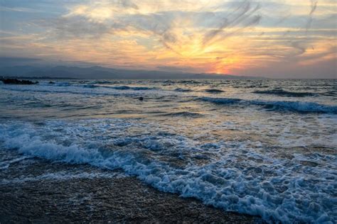 Premium Photo Mediterranean Sunset In Autumn 2023 Beach In The Evening 4