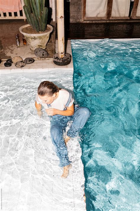 Babe Woman Wearing All Her Clothes While Swimming In Pool During Night