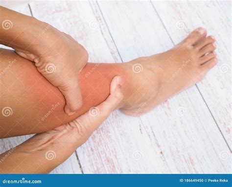 Women Suffering With Leg Pain Ankle Pain Inflammation And Red