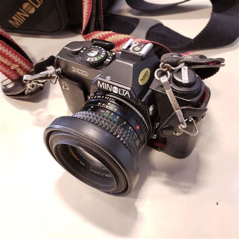 Konica minolta 2786301 dimage xt point & shoot digital camera. KONICA MINOLTA XD CAMERA W/ EXTRA LENSES AND BAG OF SUPPLIES - Big Valley Auction