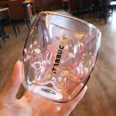 Exuding lively spring vibes, this will definitely be one of the most memorable gifts for cat lovers! Starbucks Sakura Cat Claw Paw Glass Cup Sakura Mug Coaster ...