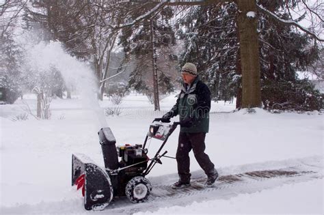 Snowblower Man Blowing Snow Away From Viewer Stock Photo Image Of