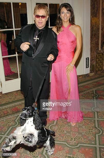 Hosted By Elizabeth Hurley And Sir Elton John Photos And Premium High