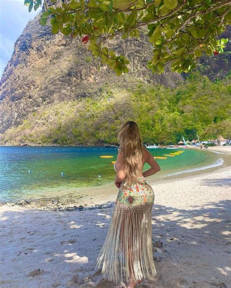 Demi Rose Flaunts Super Curves On Ibiza Beach In Tropical Pattern