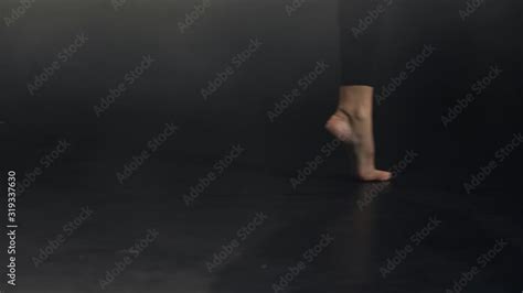 video stock close up of skillful dancer s bare feet doing chain of dance steps on black stage
