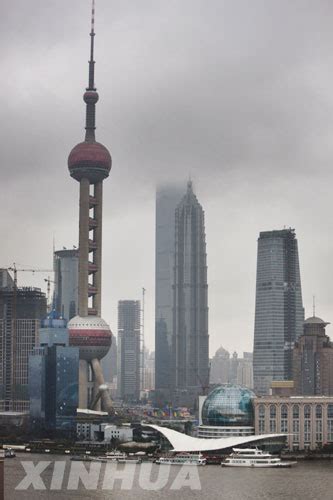 Rain Hits Residents Spirits In Shanghai Cn