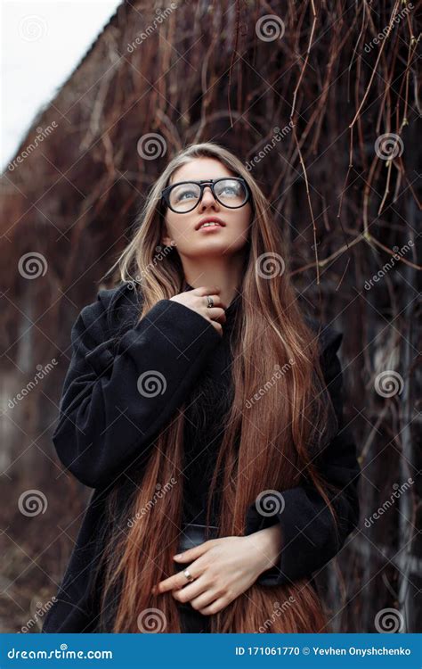Young Beautiful Fashionable Woman With Long Hair Dream Stock Photo